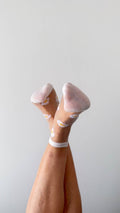 Flora - Chaussettes transparentes marguerites bordures blanches