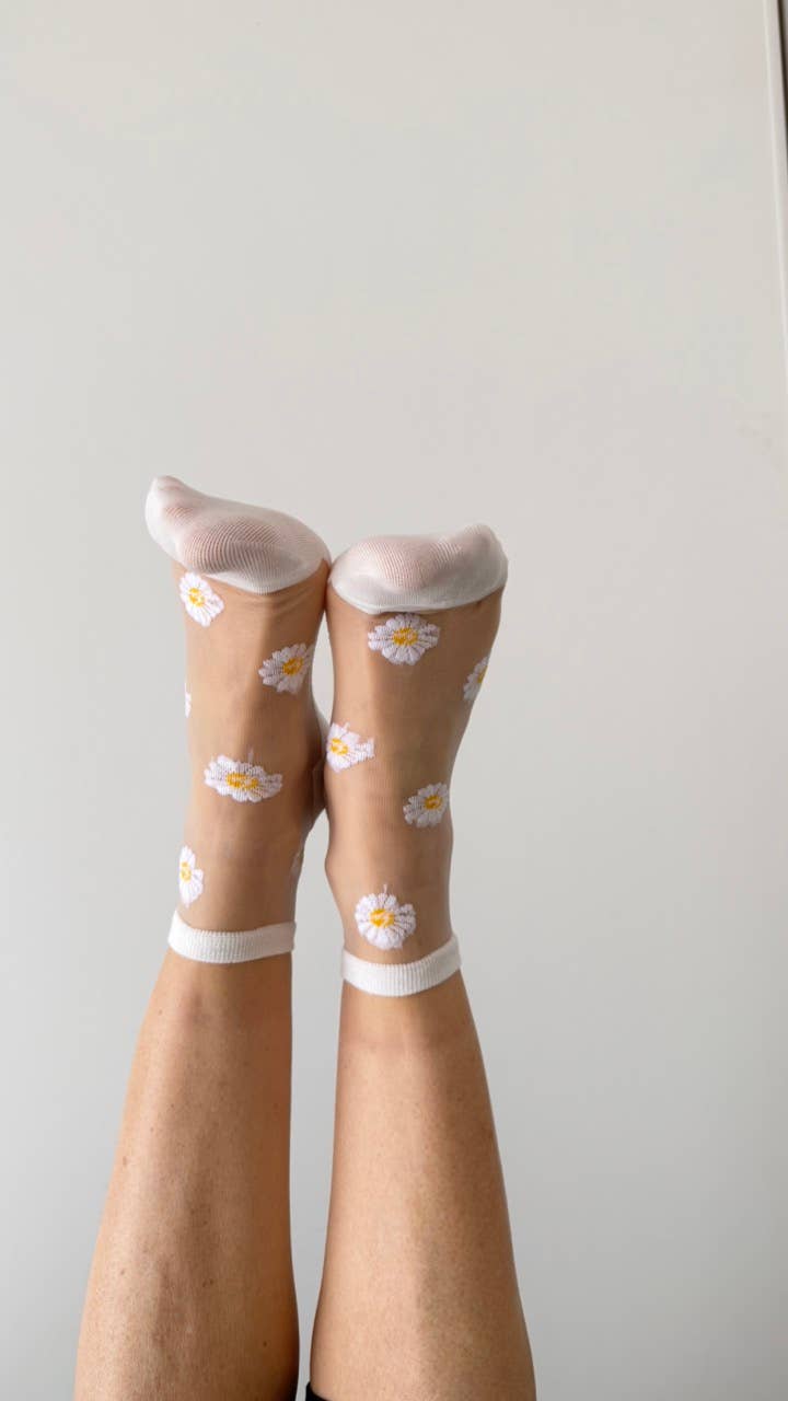 Flora - Chaussettes transparentes marguerites bordures blanches