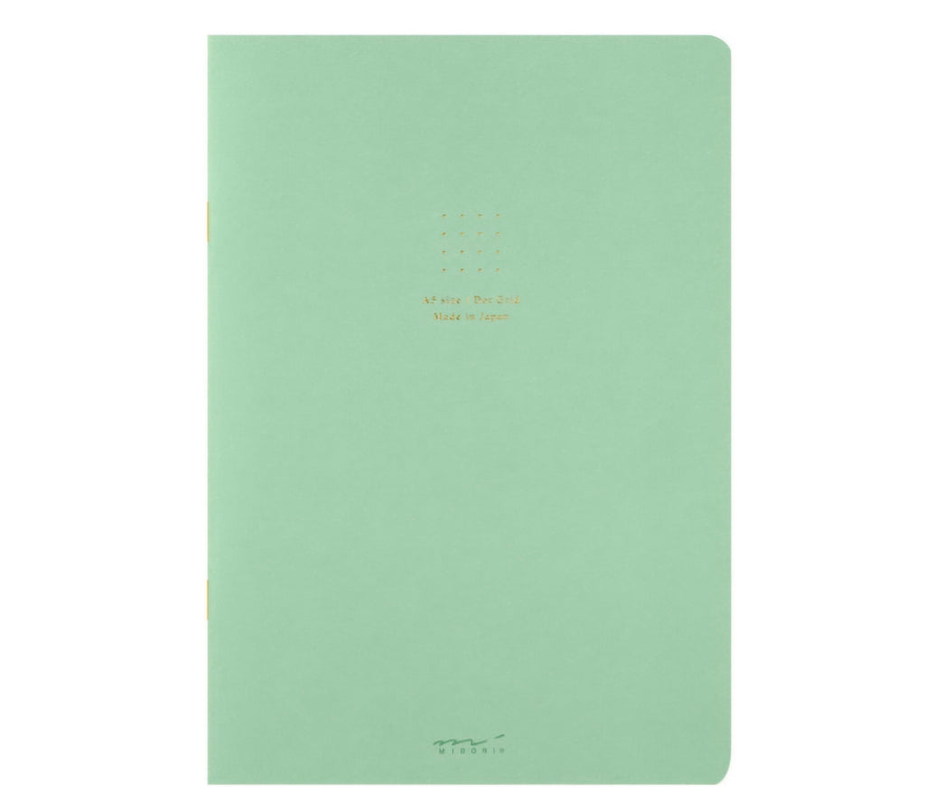 Cahier à spirales quadrillage à points verts